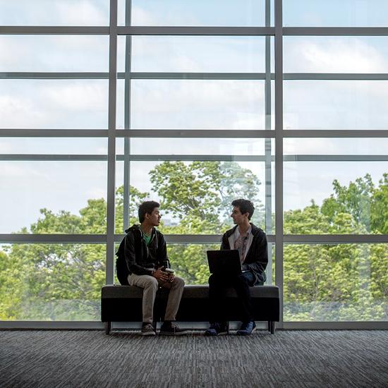 Students talking in a building